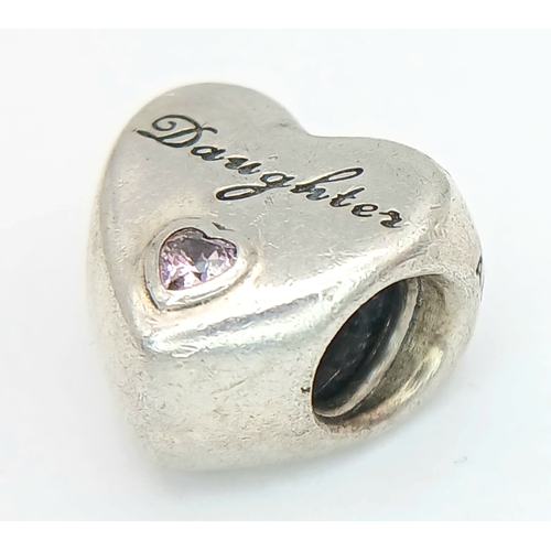 1127 - A PANDORA STERLING SILVER HEART STONE SET DAUGHTER CHARM 3.7G. Ref: SC 7099