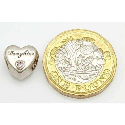 1127 - A PANDORA STERLING SILVER HEART STONE SET DAUGHTER CHARM 3.7G. Ref: SC 7099