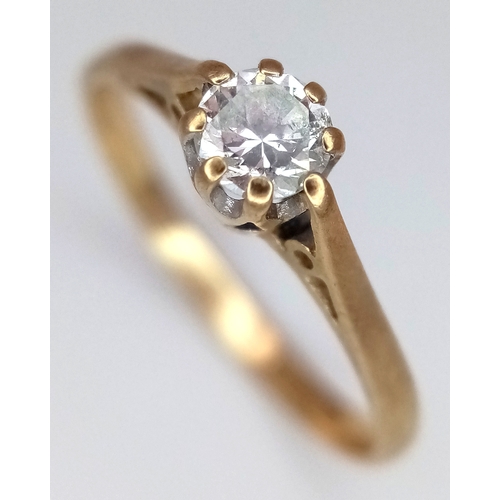 580 - A 9K Yellow Gold White Stone Solitaire Ring. Size K. 1.1g.