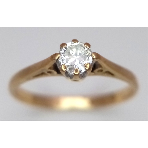 580 - A 9K Yellow Gold White Stone Solitaire Ring. Size K. 1.1g.