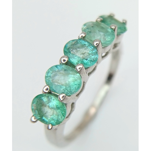662 - A Pretty Sterling Silver and Five Emerald Set Ring Size N. The Ring is set with Five 5mm Long Oval C... 