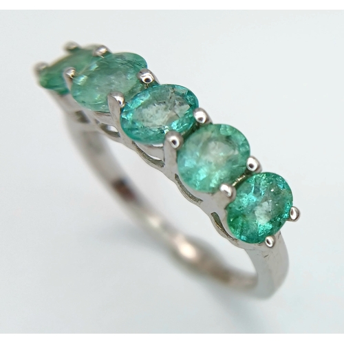 662 - A Pretty Sterling Silver and Five Emerald Set Ring Size N. The Ring is set with Five 5mm Long Oval C... 