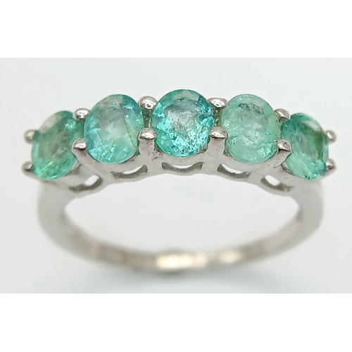 662 - A Pretty Sterling Silver and Five Emerald Set Ring Size N. The Ring is set with Five 5mm Long Oval C... 