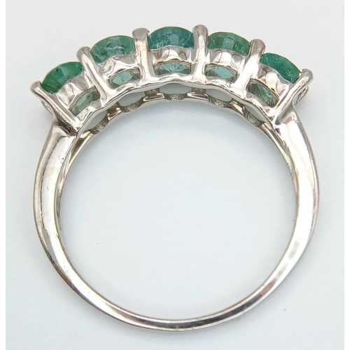 662 - A Pretty Sterling Silver and Five Emerald Set Ring Size N. The Ring is set with Five 5mm Long Oval C... 