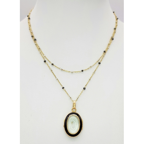 1791 - An 18K Gold, Black Onyx Oval Locket on an 18K Black diamond and Pearl Necklace. 3cm and 66cm. 5.4g t... 