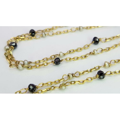 1791 - An 18K Gold, Black Onyx Oval Locket on an 18K Black diamond and Pearl Necklace. 3cm and 66cm. 5.4g t... 