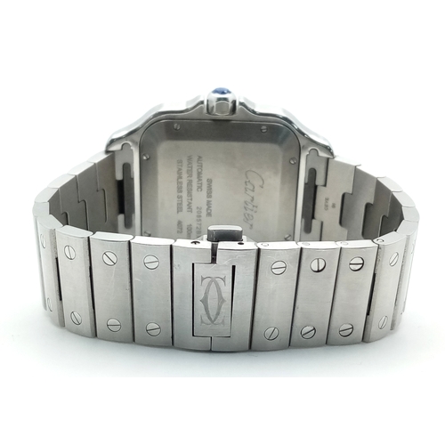 1828 - A Cartier Santos Diamond Encrusted Automatic Gents Watch. Model 4072. Stainless steel bracelet and c... 