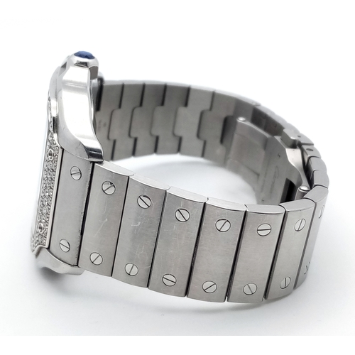 1828 - A Cartier Santos Diamond Encrusted Automatic Gents Watch. Model 4072. Stainless steel bracelet and c... 