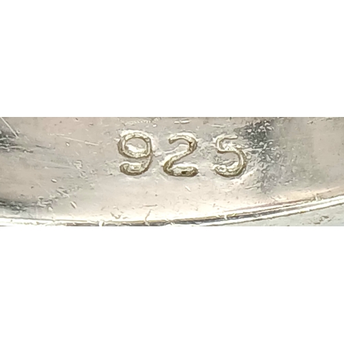 1196 - A Vintage Sterling Silver Amethyst and Peridot Ring Size S. The Ring is set with 5mm Long Oval Cut A... 