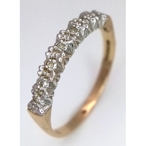 649 - A 9K YELLOW GOLD DIMAOND SET HALF ETERNITY RING 1.6G SIZE O. Ref: SC 7027