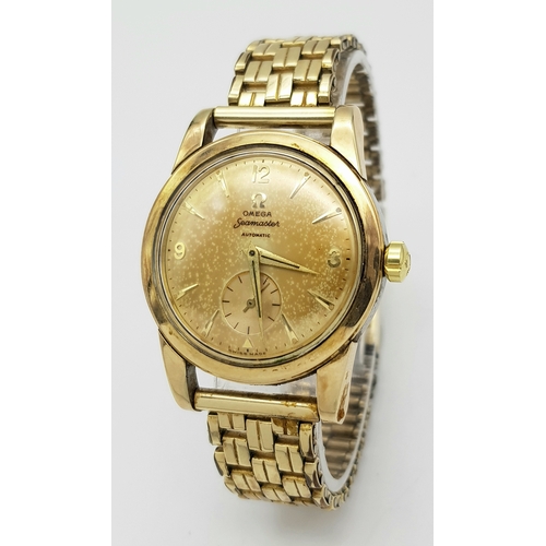 1871 - A Vintage (1950s) Omega Automatic Seamaster Gents Watch. Gilded bracelet and case - 35mm. 17 jewels.... 