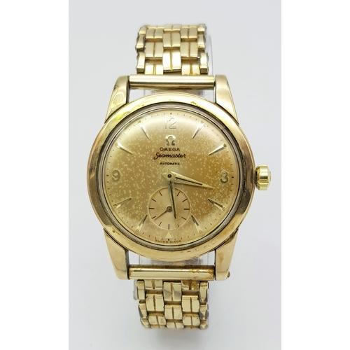 1871 - A Vintage (1950s) Omega Automatic Seamaster Gents Watch. Gilded bracelet and case - 35mm. 17 jewels.... 