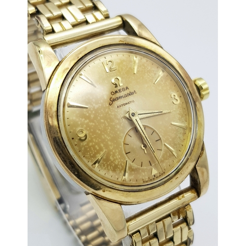 1871 - A Vintage (1950s) Omega Automatic Seamaster Gents Watch. Gilded bracelet and case - 35mm. 17 jewels.... 