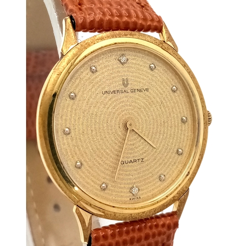 1908 - A Universal Geneve Quartz Gents Watch. Brown leather strap. Gilded case - 32mm. Gilded dial with whi... 