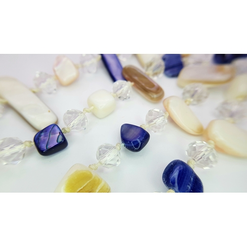 1916 - A lovely matinee length of Multi-Coloured Mother-of-Pearl and faceted Crystal Beaded Necklace.
 The ... 