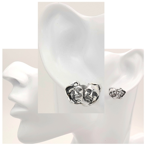 1974 - A vintage pair of silver theatre mask earrings. Total weight 2.3G.