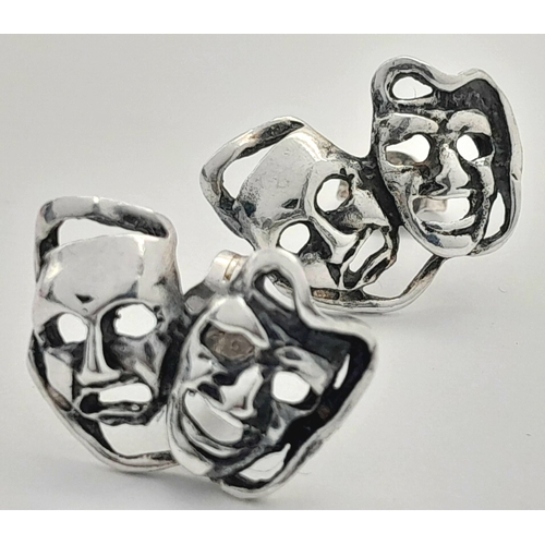 1974 - A vintage pair of silver theatre mask earrings. Total weight 2.3G.