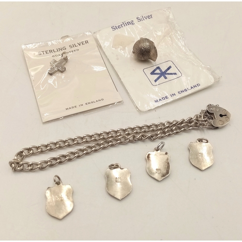 1217 - A Sterling Silver Padlock Bracelet for Charms including Six Sterling Silver and Silver Vintage Charm... 