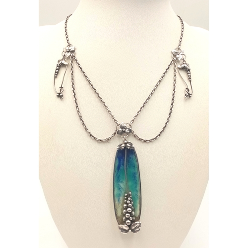 1414 - A stunning silver enamelled pendant, set on a silver necklace. Total weight 27.1G, total length 42cm... 