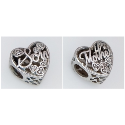 1071 - A PANDORA STERLING SILVER MOTHER / SON CHARM 1.6G. Ref: SC 7094