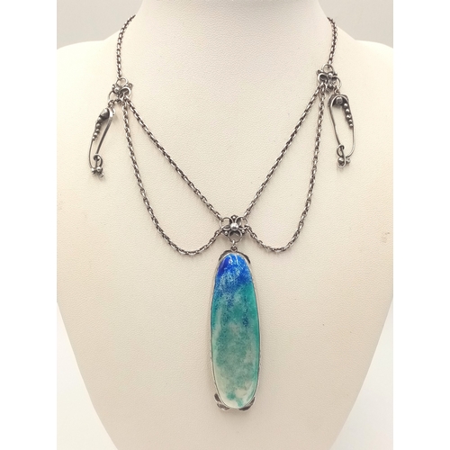 1414 - A stunning silver enamelled pendant, set on a silver necklace. Total weight 27.1G, total length 42cm... 
