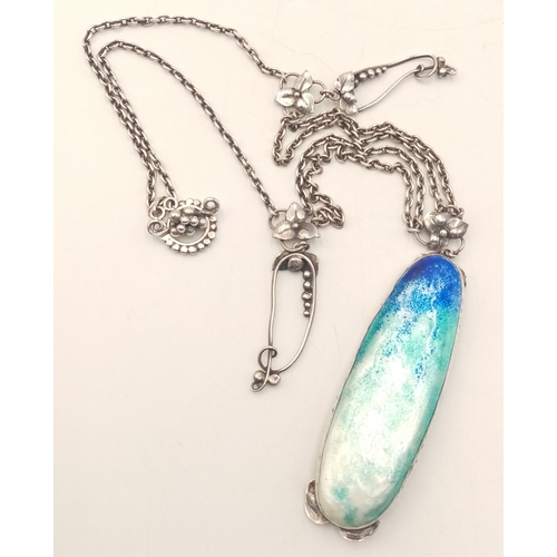 1414 - A stunning silver enamelled pendant, set on a silver necklace. Total weight 27.1G, total length 42cm... 