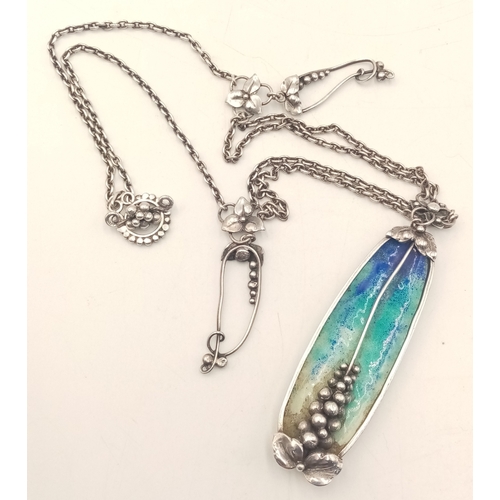 1414 - A stunning silver enamelled pendant, set on a silver necklace. Total weight 27.1G, total length 42cm... 
