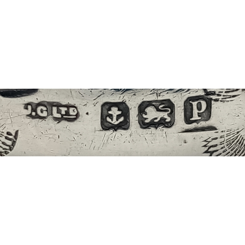 1705 - An antique sterling silver napkin holder with floral motive engravings. Full Birmingham hallmarks, 1... 