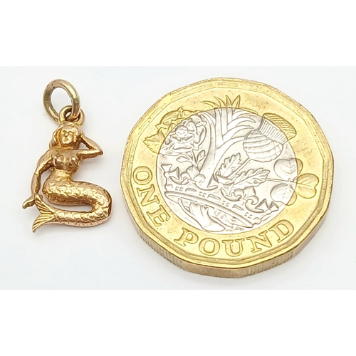 656 - A 9K YELLOW GOLD MERMAID CHARM / PENDANT  1.3G. Ref: SC 7017