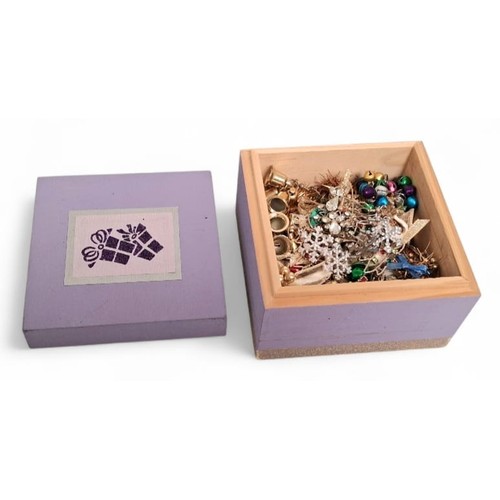 647 - A Collection of 16 Pairs of Novelty Christmas Earrings. Presented in a present decorated wooden box.