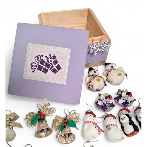 647 - A Collection of 16 Pairs of Novelty Christmas Earrings. Presented in a present decorated wooden box.