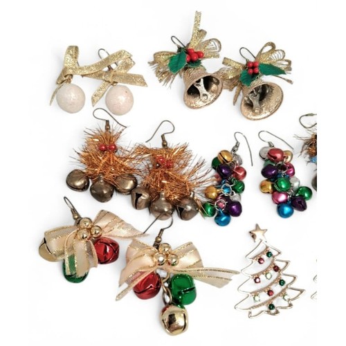 647 - A Collection of 16 Pairs of Novelty Christmas Earrings. Presented in a present decorated wooden box.