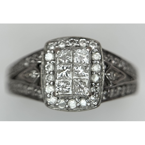 724 - An Art Deco Style, 14K White Gold Diamond Cluster Ring. Set with c. 0.75ctw of high grade Princess a... 