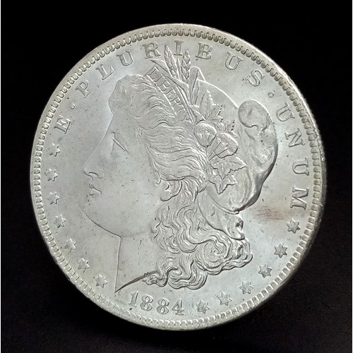 1767 - An 1884 USA Morgan Silver Dollar Coin. EF+.