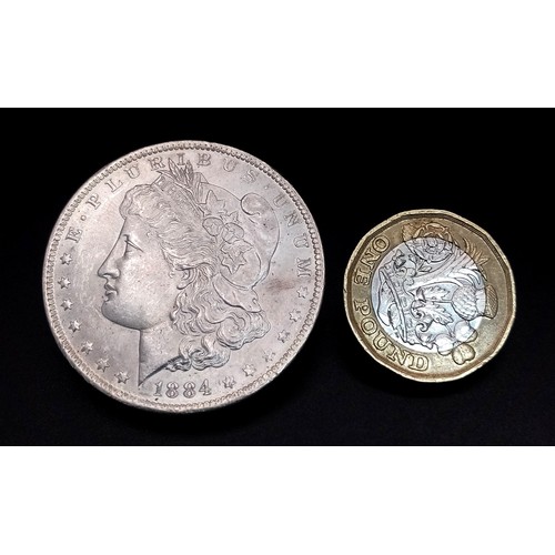 1767 - An 1884 USA Morgan Silver Dollar Coin. EF+.