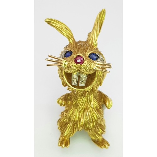 A vintage Kutchinsky designer 18K Yellow Gold Bunny Brooch with Diamond Set Teeth, Sapphire Eyes and Ruby Nose! 5.5cm. 23.7g total weight. MK12.