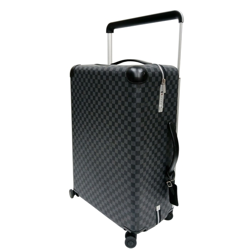 A Louis Vuitton Horizon 55 Suitcase. Damier graphite canvas. Silver tone hardware. Black calfskin leather trims. Telescopic push handle. Wrap around zip. Four wheels. Spacious interior. 62cm height x 44cm width x 23cm depth. In good condition but as always please see photos. Comes with a certificate of authenticity. Priced to sell. Winning bidder is advised to pick up from Cadmore HQ. STK025515