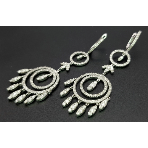 774 - An Art Deco Style Pair of 18K White Gold, Pave Diamond Circle Drop Earrings. 6cm drop. 15.8g. Ref: 2... 