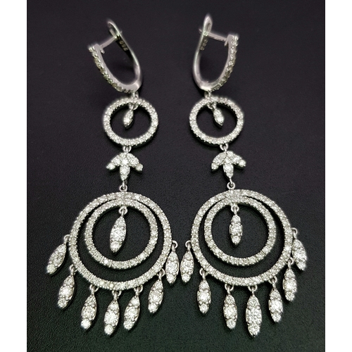 774 - An Art Deco Style Pair of 18K White Gold, Pave Diamond Circle Drop Earrings. 6cm drop. 15.8g. Ref: 2... 