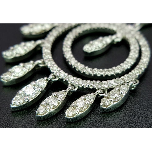 774 - An Art Deco Style Pair of 18K White Gold, Pave Diamond Circle Drop Earrings. 6cm drop. 15.8g. Ref: 2... 