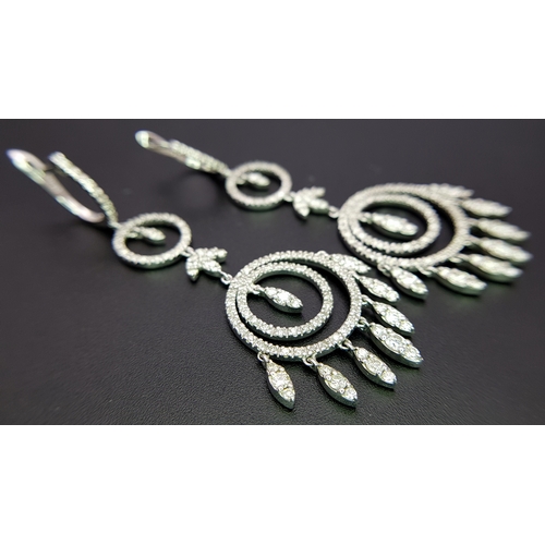774 - An Art Deco Style Pair of 18K White Gold, Pave Diamond Circle Drop Earrings. 6cm drop. 15.8g. Ref: 2... 