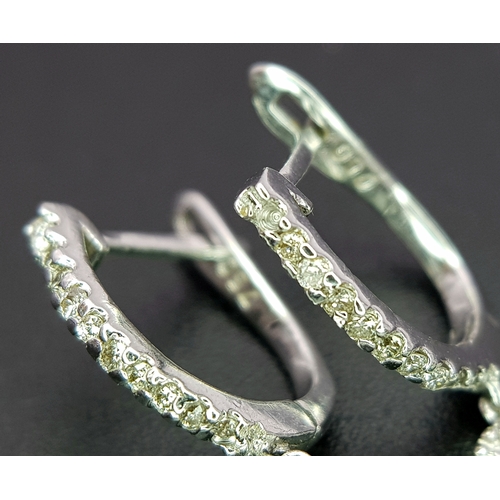 774 - An Art Deco Style Pair of 18K White Gold, Pave Diamond Circle Drop Earrings. 6cm drop. 15.8g. Ref: 2... 