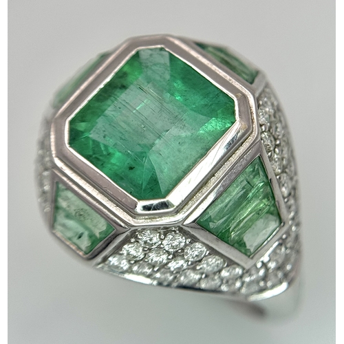 1572 - A Stunning W.G.I Certified 18K White Gold, Emerald and Diamond Ring. A 2.05ct Brazilian octagonal st... 