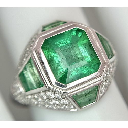 1572 - A Stunning W.G.I Certified 18K White Gold, Emerald and Diamond Ring. A 2.05ct Brazilian octagonal st... 
