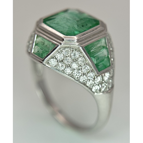 1572 - A Stunning W.G.I Certified 18K White Gold, Emerald and Diamond Ring. A 2.05ct Brazilian octagonal st... 