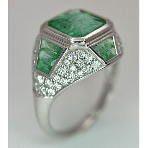1572 - A Stunning W.G.I Certified 18K White Gold, Emerald and Diamond Ring. A 2.05ct Brazilian octagonal st... 