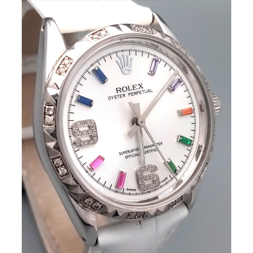 310 - A VERY SPECIAL ROLEX OYSTER PERPETUAL WITH DIAMOND BEZEL AND GEMSTONE NUMERALS, CUSTOM MADE AND COMI... 