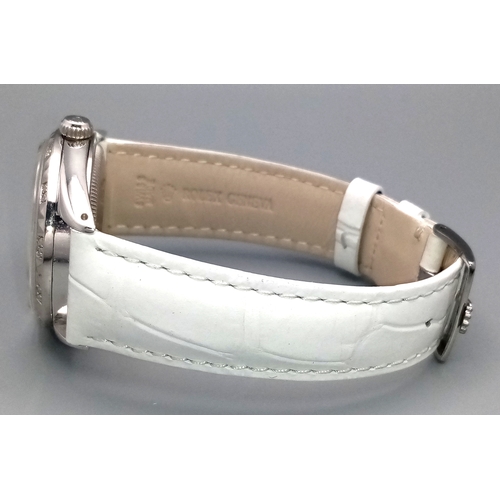 310 - A VERY SPECIAL ROLEX OYSTER PERPETUAL WITH DIAMOND BEZEL AND GEMSTONE NUMERALS, CUSTOM MADE AND COMI... 