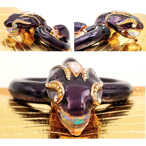 37 - A Gucci Gold Lizard-Effect Clutch with Jewelled Snake Handle. Gold metallic lizard-embossed leather ... 