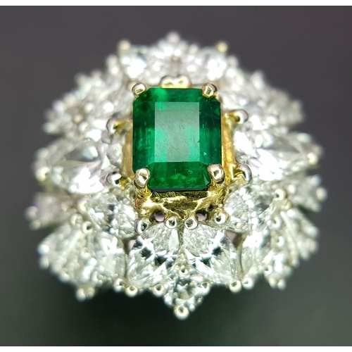 1771 - A W.G.I Certified 18K White Gold, Emerald and Diamond Dress Ring. Central Colombian 1.4ct octagonal ... 